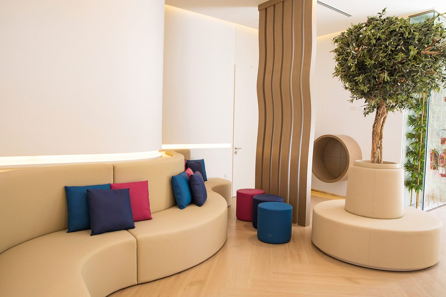 A waiting lounge with curved seating