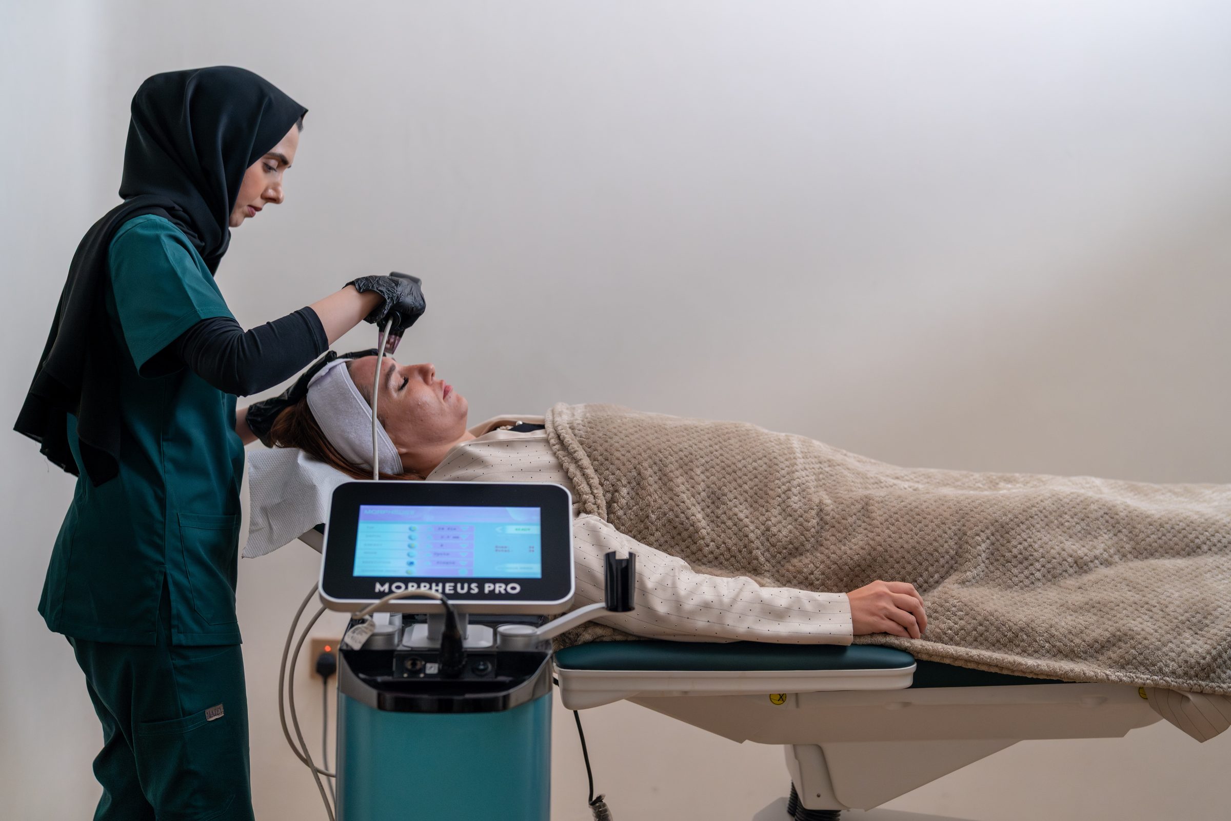 A doctor during a Morpheus8 treatment
