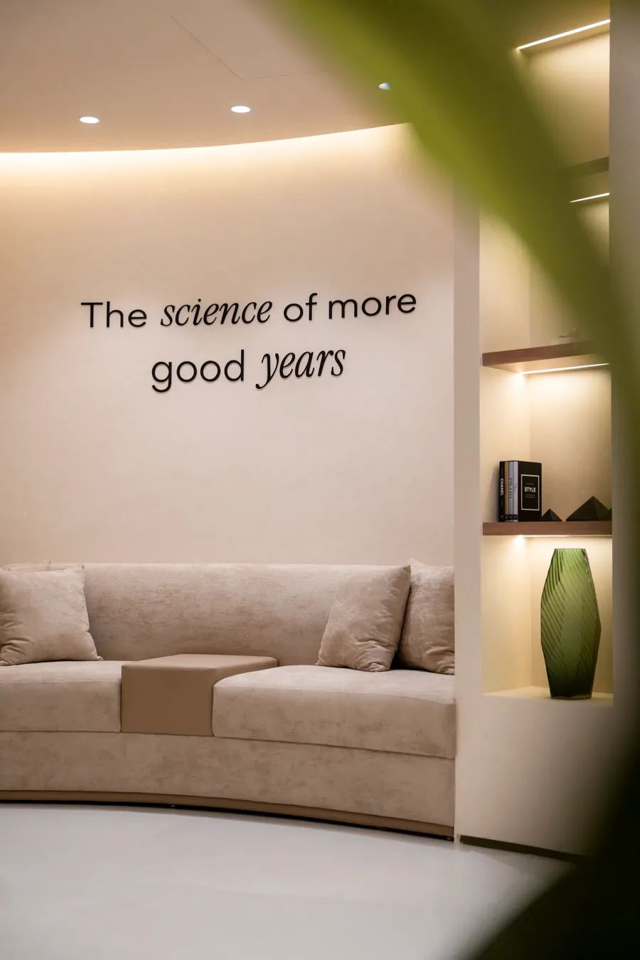 A lounge at Shookra Palm Jumeirah under the words “The science of more good years”